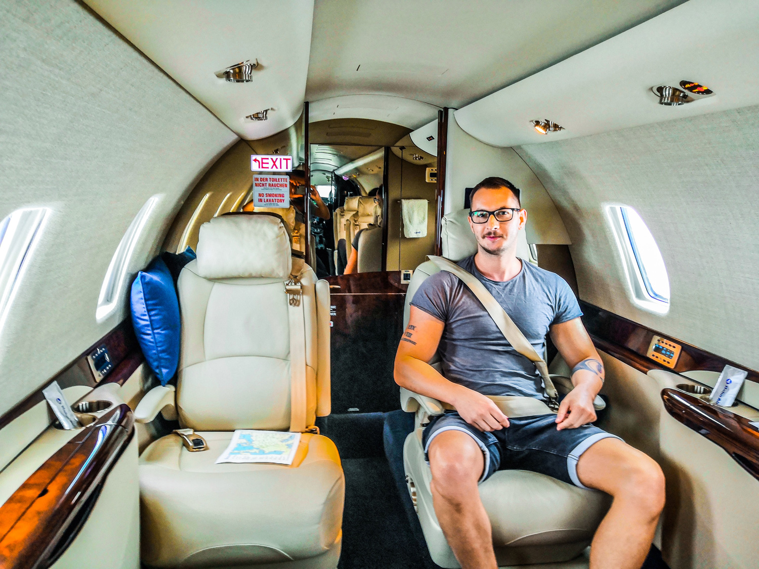 man sitting on a private jet