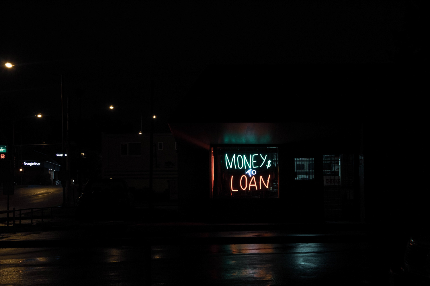 money loan neon sign in store window