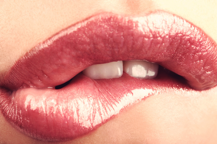 woman biting lip
